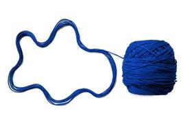 Knitting yarn on isolated white background photo