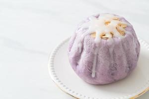 taro bun with white sugar cream and nut photo
