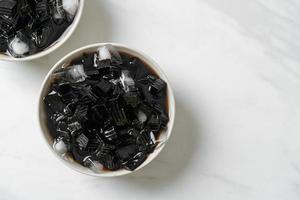 Black grass jelly with ice photo