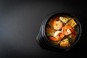 Sour soup made of Tamarind Paste with Shrimps and Vegetable Omelet photo