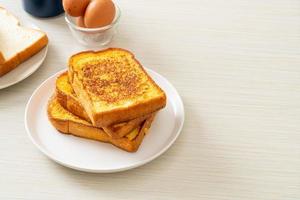 french toast on white plate photo