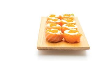 fresh salmon sushi roll with mayonnaise and shrimp egg photo