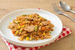 pork fried rice on white plate photo