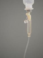 Set IV saline saline solution Fluid filled in pediatric patient hand in the hospital photo
