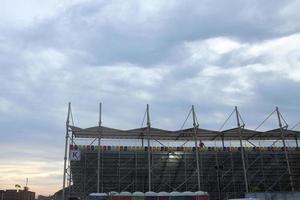 Close-up shot of VIP tribune with canopy under blue light sky photo