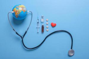 Creative flat lay composition of world health day on pastel blue background photo