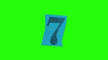 número 7 - papel de animação de nota de resgate cortado na tela verde