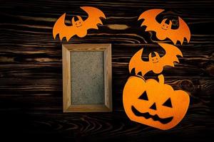 Halloween background with bats, pumpkins. Halloween holiday background. photo