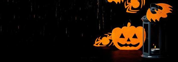 Halloween background with spider, bats, pumpkins and lantern. Halloween holiday background. photo