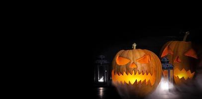 Halloween background with pumpkin head lantern and candles. Halloween pumpkin Jack-o-Lantern photo