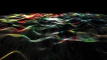 Loop of colorful particles wave technology background video