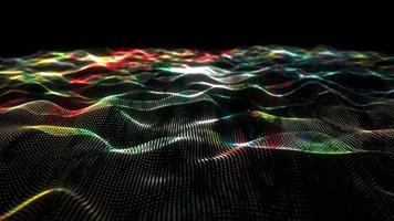 Loop of colorful particles wave technology background video