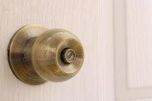 Door knobs on white doors with locks photo