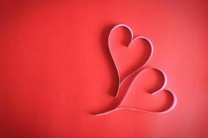 Heart paper on the background of red art paper valentine valentine's day valentine's day - picture photo