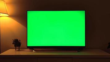 Televisore con schermo verde 8K in casa video