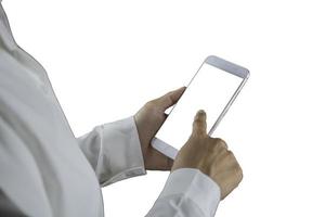 A woman is using a mobile phone to communicate on a white background. photo