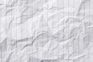 White lined paper. Crumpled paper. crease by hand recycled photo