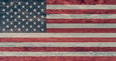 American flag on wooden background. National flag of the United States of America. 4th of July background. The Stars and Stripes. The Star-Spangled Banner. USA flag emblem. National symbol and ensign. photo