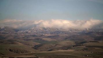 8K Mist Cloud Flowing Down Ridge of Mountain Range video