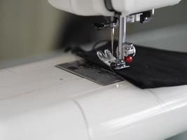 Closeup sewing machine accessories equipment photo