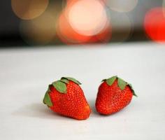 Strawberry red fruit on white background photo