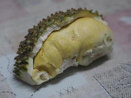 Durian fruit with sharp bark Flesh in the sweet yellow color photo