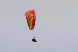 Paragliding over mount Tahtali in Antalya, Turkey photo