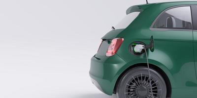 coche eléctrico verde compacto cargando con espacio de copia foto