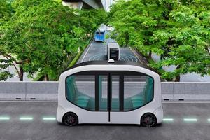 Autonomous electric shuttle bus self driving across city green road, Smart vehicle concept photo