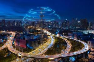 Smart cars with automatic sensor driving on metropolis with wireless connection photo