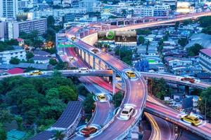 Smart cars with automatic sensor driving on metropolis with wireless connection photo