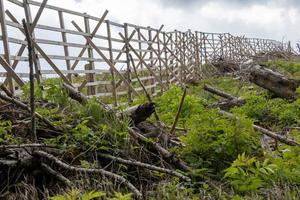 wooden fence in the mountains photo