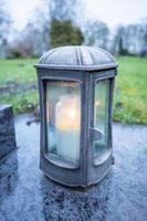 Grave decoration with candle photo