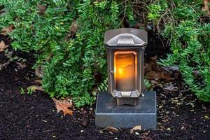 Grave decoration with candle photo