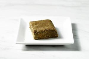Store Bought Instant Curry Japanese Paste Block on White Plate photo