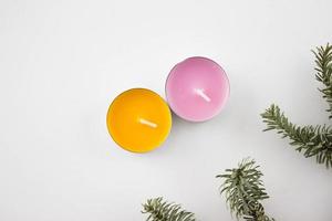 Christmas background with candles and branches on white with place for text. photo