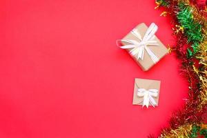 Gift Boxes and Decorations on Red Background photo