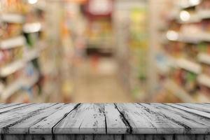 Empty gray wood tables and shelves, blurred background photo