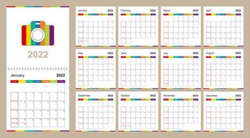 Colorful wall calendar for 2022 on beige background, week starts on Sunday. vector