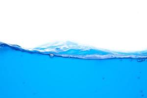 Moving blue water surface and bubbles on a white background photo