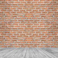 Red brick walls and wooden floors are combined into empty rooms and backgrounds. photo