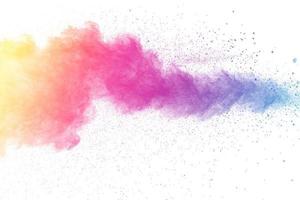 Multi color powder explosion on white background. photo