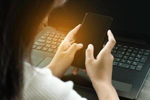Cropped image of professional business woman working at home office via laptop, manager using portable computer device  work process concept photo