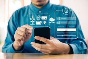 Businessman user typing login and password in network of cyber security, information security, data protection, two-step verification, big data, for secure access to user's personal information photo