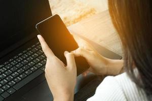 Cropped image of professional business woman working at home office via laptop, manager using portable computer device  work process concept photo