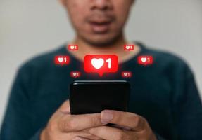 Close up hands holding smartphone. man using cellphone for marketing  and searching data and social media on internet.technology business investment concept photo