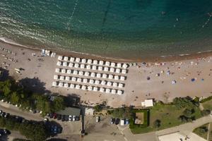 Aerial view on beach by Sveti Stefan inslet in Montenegro
