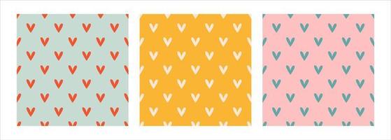 Set of three cute seamless pattern with simple small heart. Trendy hand-drawn colorful hearts. Valentine's day, love concept. Minimalistic repeatable design for stationery, textile, web design vector