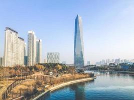 Incheon city, South Korea, 2021 - Autumn in Central Park of Incheon city. High buildings under a lake photo