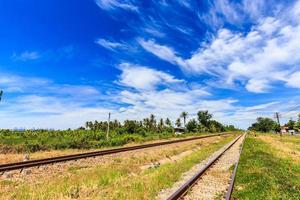 Railroad track in countryside of Thailand photo